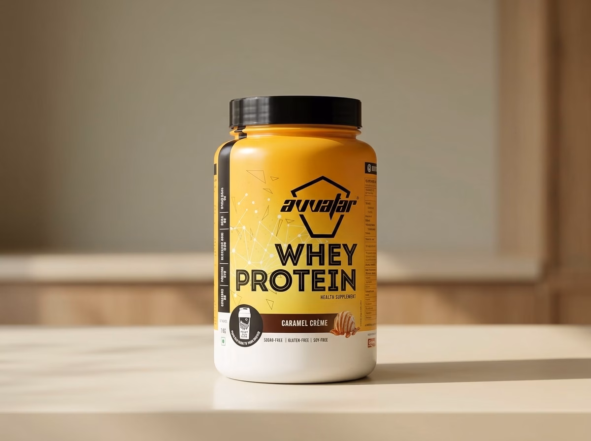 Avvatar Whey Protein, 1 kg, Caramel Crème tub on a kitchen counter