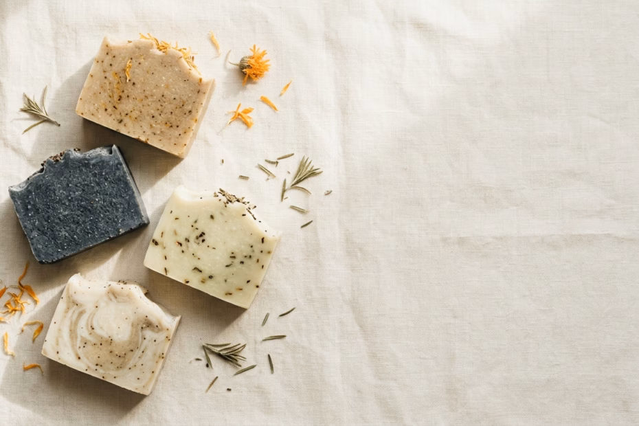 Overhead flat-lay of handmade cold-process soap bars, illustrating a guide to the best chemical free soap in India
