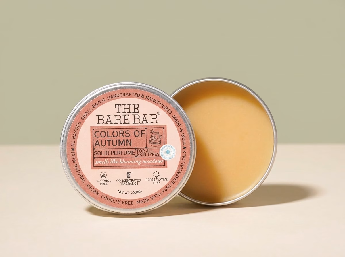 The Bare Bar Colors of Autumn solid perfume in a 20 g tin, an alcohol-free balm perfume with rose and geranium